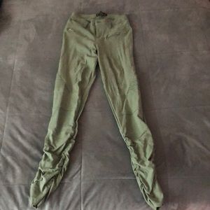 I am selling a light green latex fitted jeans